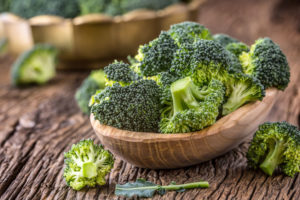 Broccoli.Raw fresh broccoli on old wooden table